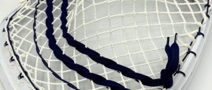 Goalie net with braided strings.