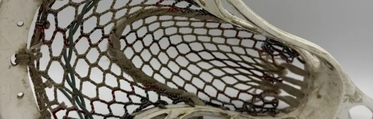 a example of a lacrosse stick that needs to be restrung