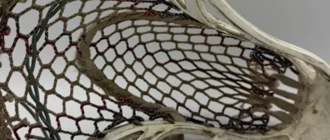 a example of a lacrosse stick that needs to be restrung