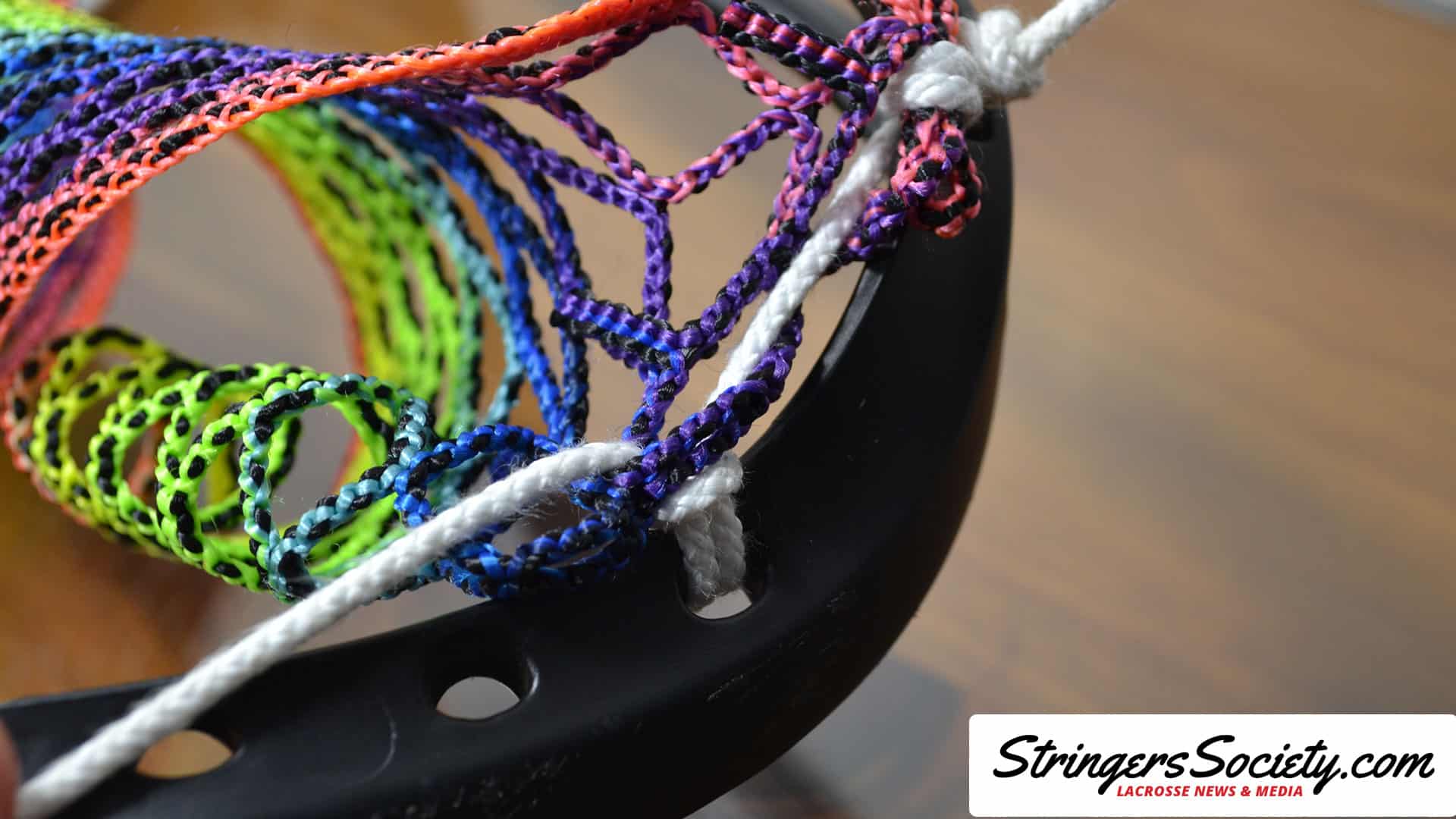 How to String a Women's Lacrosse Head womens lacrosse topstring step 7